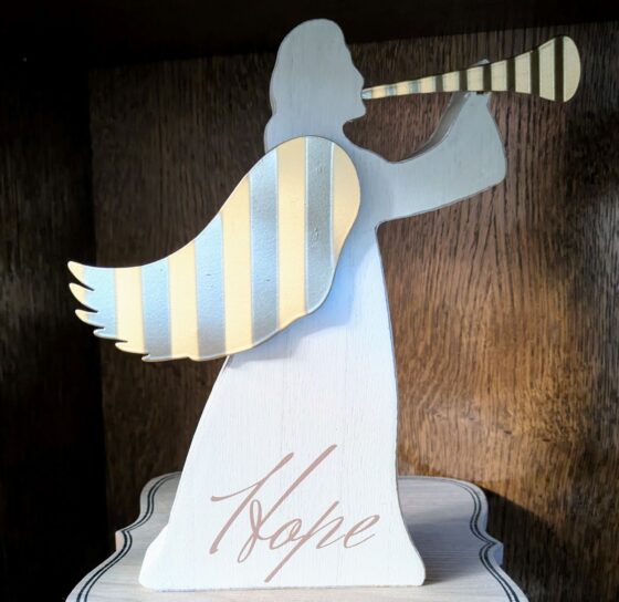 An angel with word hope